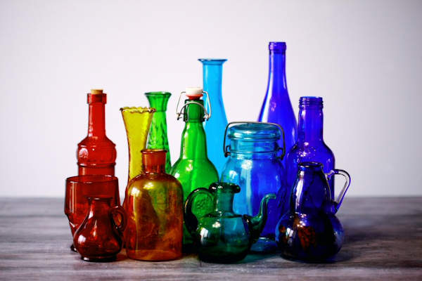 A group of colourful glass bottles and jars - all recyclable!